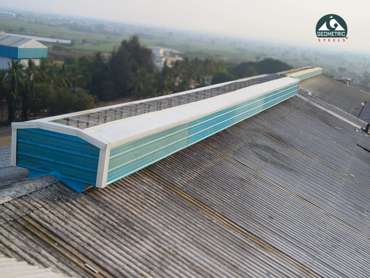 Geometric Steels industrial ridge vent installed along the ridge of a factory roof
