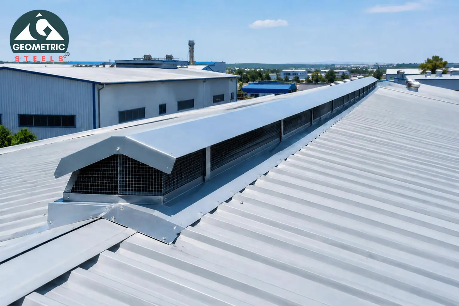 Geometric Steels industrial ridge vent installed along the ridge of a factory roof